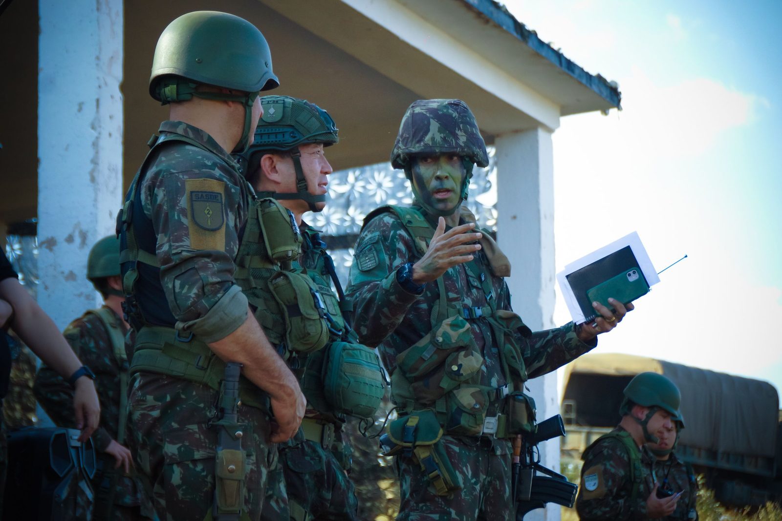 A briefing delivered to a small unit in the field